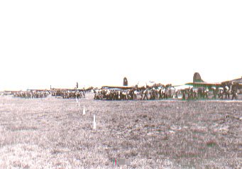 Former prisoners loading aboard aircraft