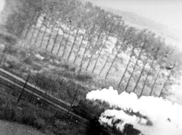 Eighth Air Force fighters strafe a German locomotive in western Germany