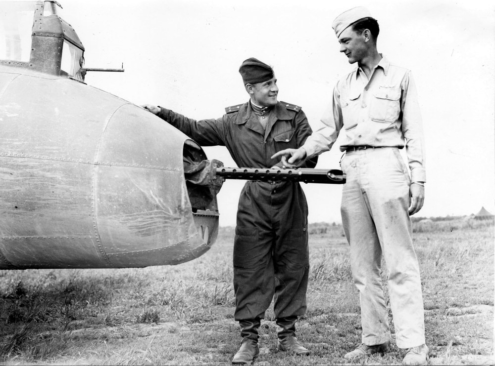 Lt Vorokev of the Soviet Air Force at a B-17 gunner's position at Poltava